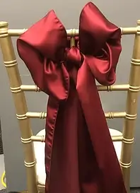 Satin bow top middle chair sash rental for events in Chicago suburbs