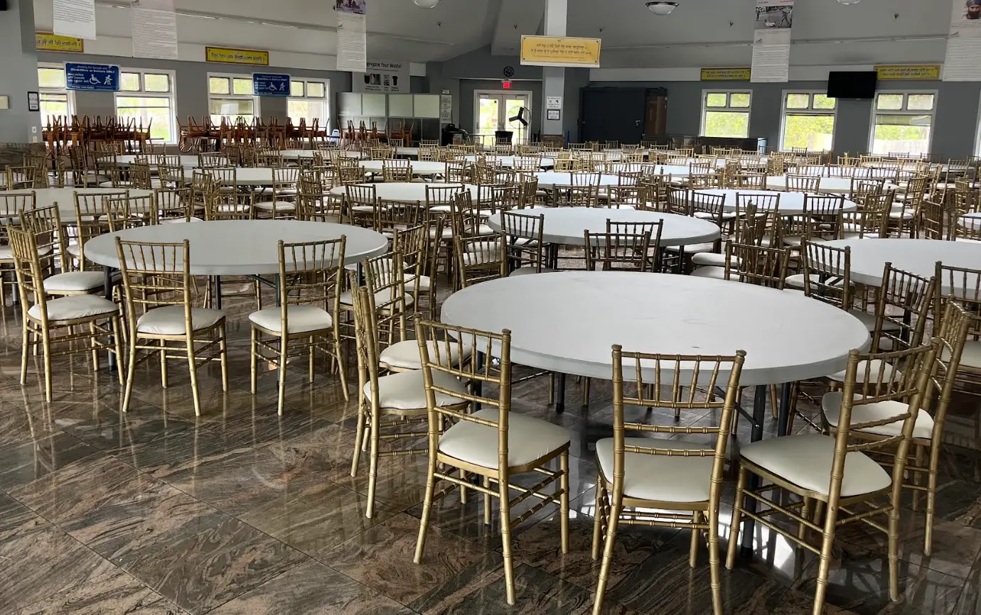 Gold chiavari chairs with round table rentals for weddings in Chicagoland IL