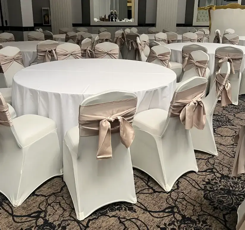 White spandex chair cover with champagne sash rental Chicagoland and Northwest Indiana